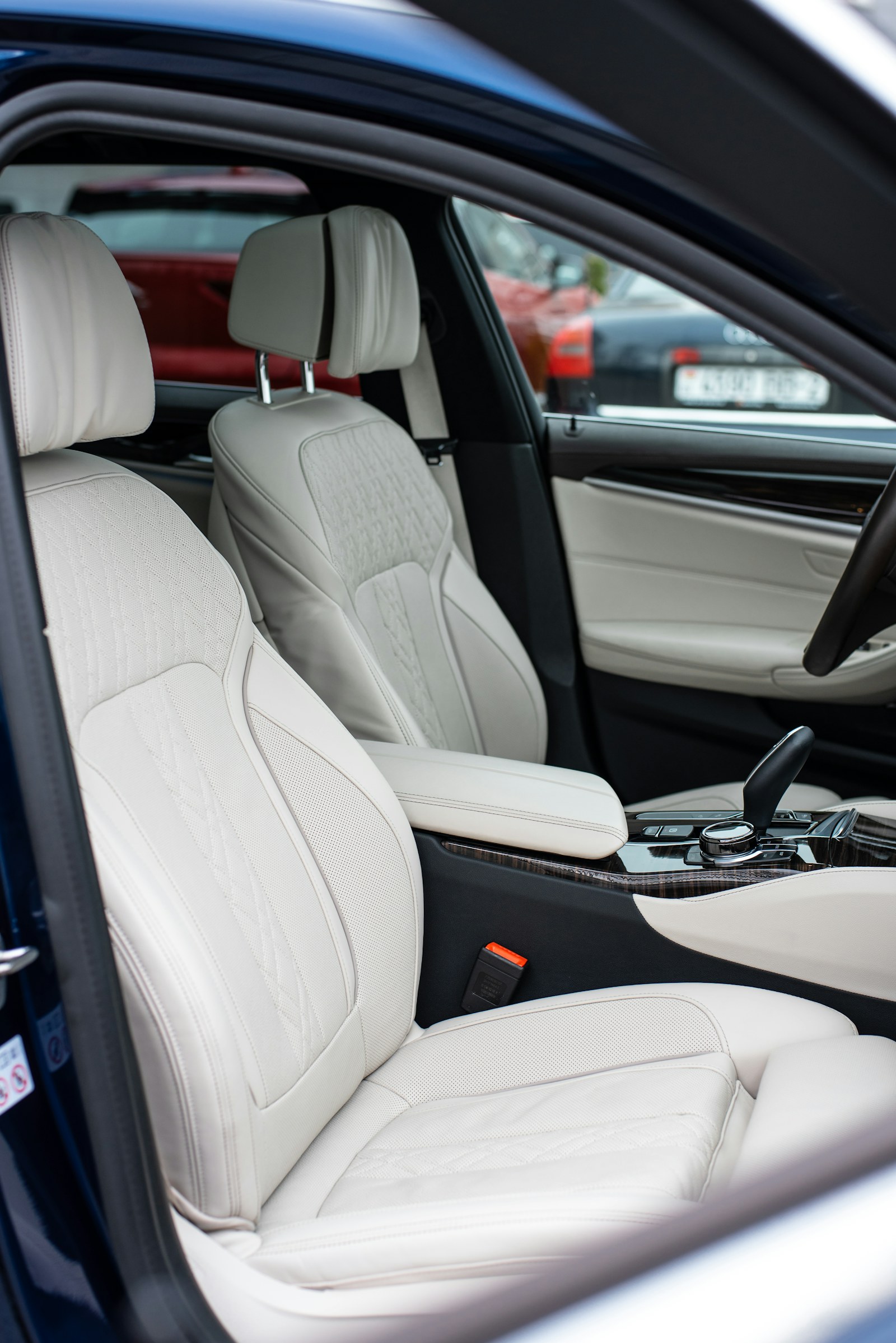Conditioned brown leather seats in a clean luxury car interior